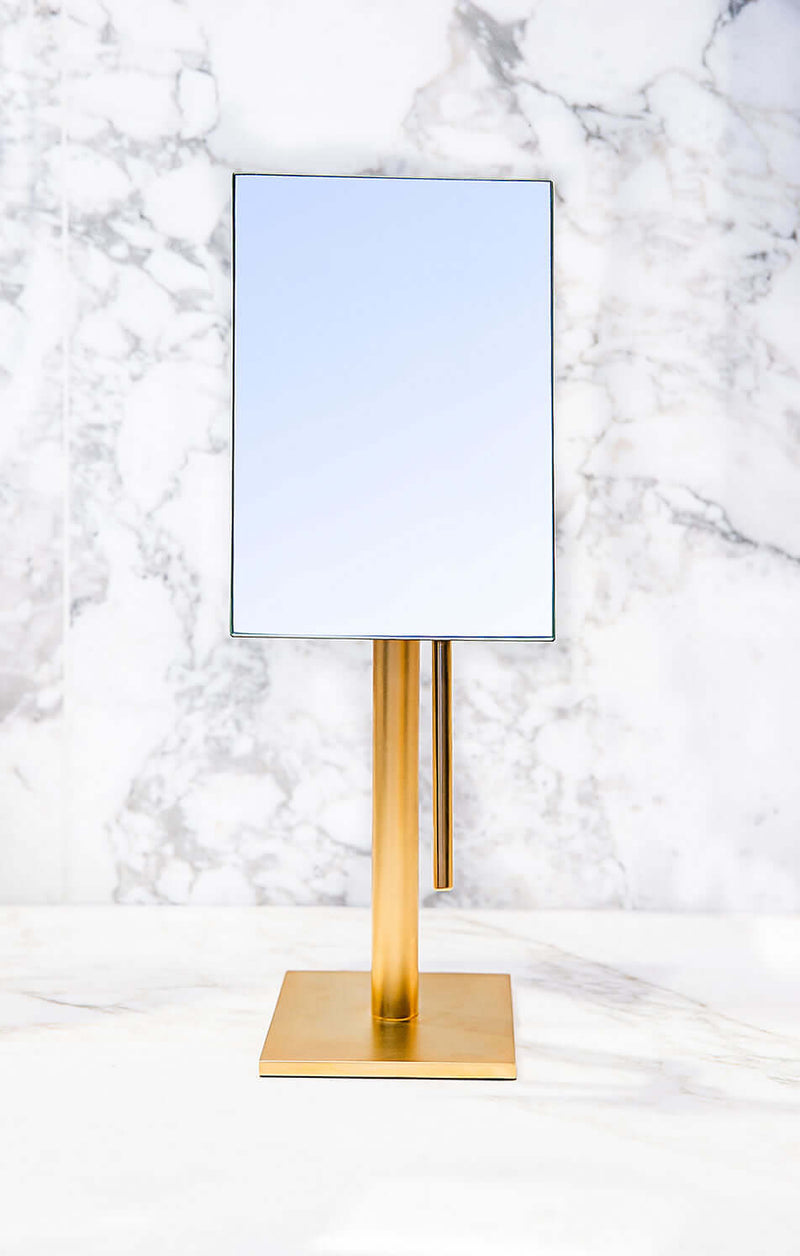 Shown in Polished Gold, the framelss Epure rectangular mirror has a 5&quot; x 7&quot; viewing area.