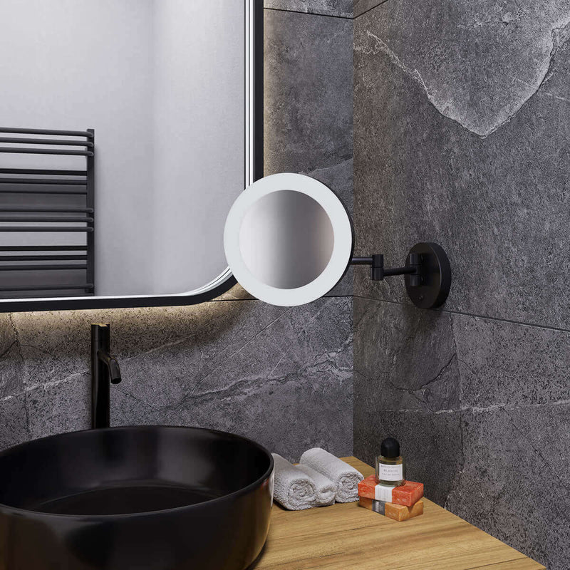 The Electric Mirror "Glamour" hardwire mirror fits in perfectly with a modern matte black motif.
