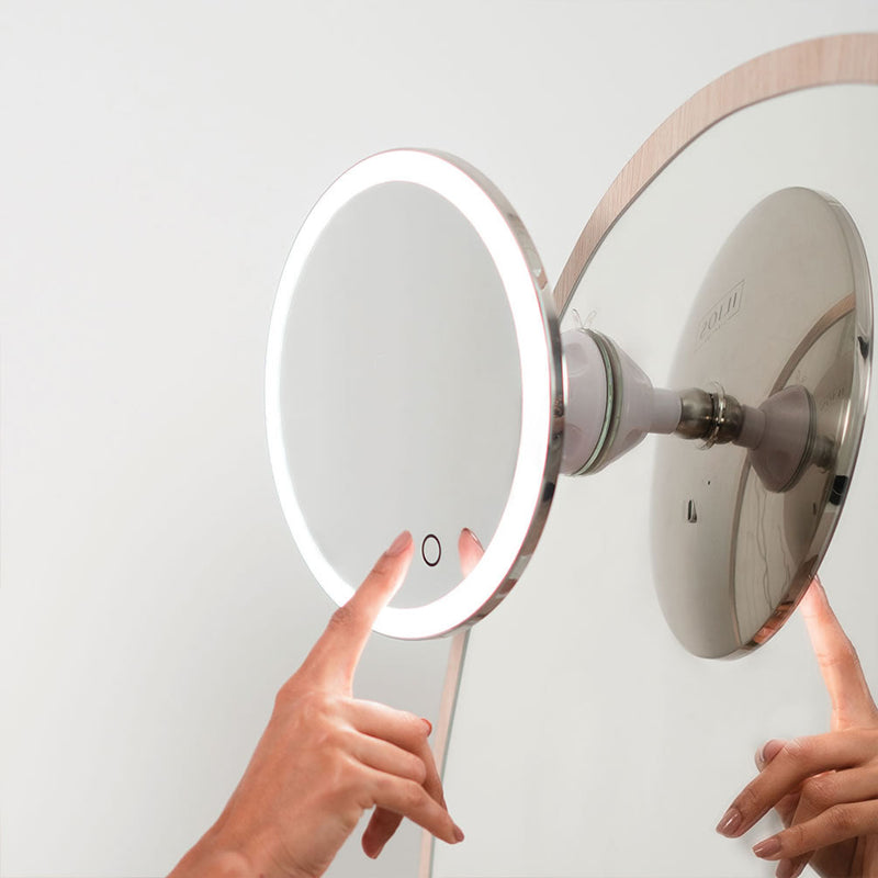 Rechargeable, the cordless mirror remains fully operational on the sction cup mount.