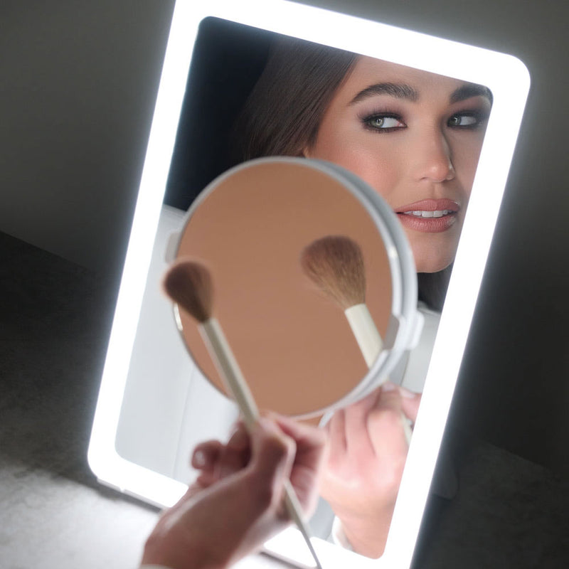 The Ilios 5x Makeup Mirror attaches magnetically to the Ilios Slim mirror.