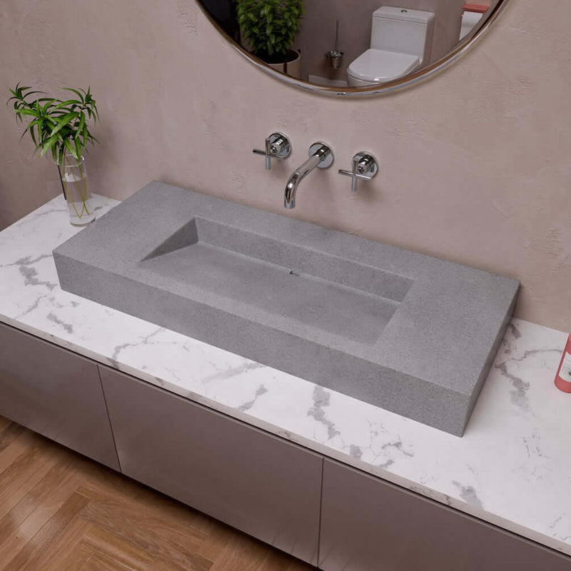 Alfi brand 48" rectangular solid concrete sink with unique drain at the rear center. Pop-up drain included.